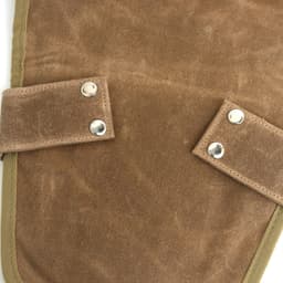 A brown garden tool waist pouch with silver snaps, featuring a sturdy fabric and reinforced edges.