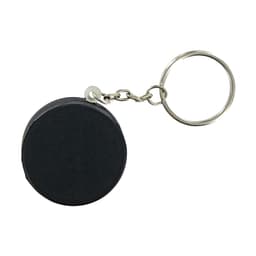A keyring featuring a black hockey puck stress reliever with a metal chain attached.