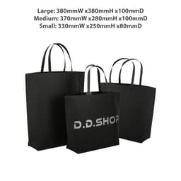 A large black boutique paper bag with two handles, featuring a logo and dimensions of 380 x 380 x 100mm.