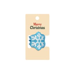 A blue snowflake hair claw featuring glitter, displayed on a festive card with a logo.