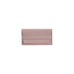 A pink PU leather glasses pouch with a simple design and a rear pocket, featuring a logo.