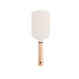 A paddle brush with a white head and a light wooden handle, featuring a circular hole at the base.