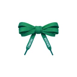 A pair of green custom shoe laces tied in a bow, featuring text on the ends and a logo.