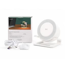 A white night light speaker with a wireless charging pad, accompanied by a charging cable and a box.