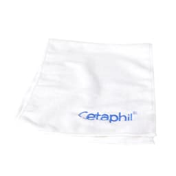 A white travel towel featuring a blue logo, folded neatly on a white background.