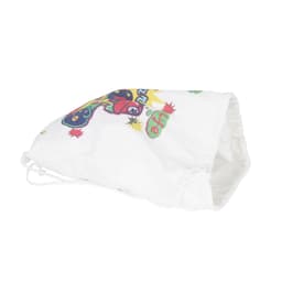 A white cotton drawstring bag featuring colourful graphics and a logo. The bag is partially folded.