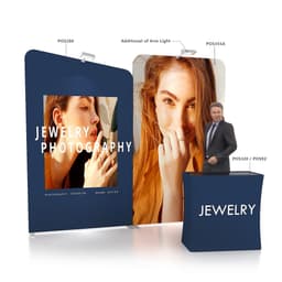 Inclined portable exhibit display wall featuring vibrant images and a dark blue colour scheme, includes a branding element and an arm light.