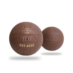 A vintage brown soccer ball featuring stitching details and a logo, set against a plain background.