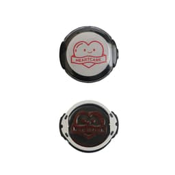 A custom self-inking stamp featuring a black design with a heart logo in red and white. It has a circular shape.