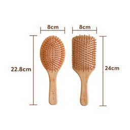 A bamboo hair brush featuring an oval and rectangular design, with wooden bristles and a natural finish.