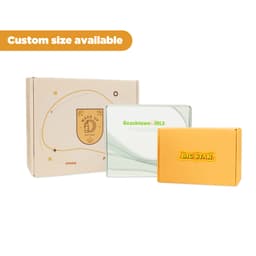 Three product boxes in various colours: a brown box with a logo, a clear box, and an orange box with branding.