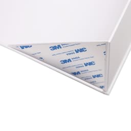 A small foldable white magnetic box with a ribbon and a 3M double-sided tape at the corner.