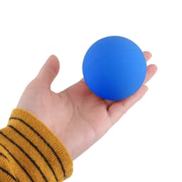 A blue bouncy ball held in a hand, with a smooth surface and no visible text or branding.