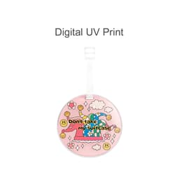 Acrylic luggage tag featuring a playful design with a pink background, smiling elements, and a whimsical pattern.