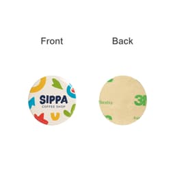 A colourful circular sticker featuring playful designs and a logo, with a smooth adhesive back.