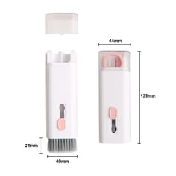 A compact white cleaning kit featuring a brush and a pink silicone attachment, with a protective cover.