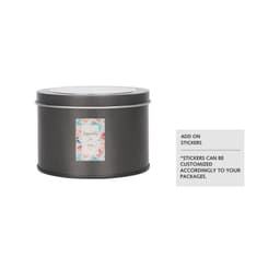 A medium grey tin can with a transparent window, featuring a decorative label and a logo.