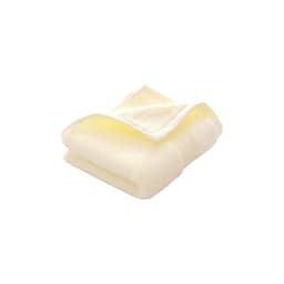 A folded embroidered cotton hand towel in soft yellow, featuring a subtle texture and a logo.