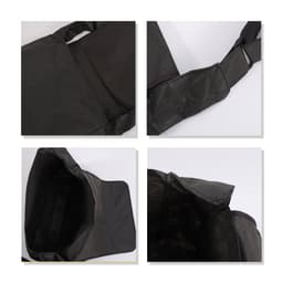 A black messenger bag with a spacious interior and adjustable shoulder strap, featuring a logo.