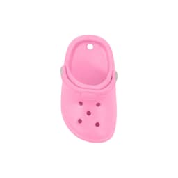 A pink clog shoe fridge magnet features a classic design with ventilation holes and a back strap.