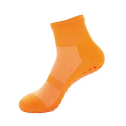 Bright orange crew socks with gripper soles, featuring a textured design and a logo.
