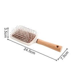 A paddle brush with a white base and a wooden handle, featuring a bristle design for styling hair.