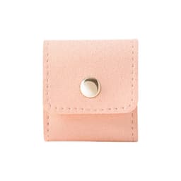 A pink mini synthetic leather jewellery bag with a snap closure and stitching detail. It features a small logo.