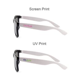 Stylish black sunglasses featuring white arms with printed branding. Includes two different print styles on the arms.