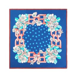 A blue silk chiffon scarf featuring a floral design and a decorative border in contrasting colours.