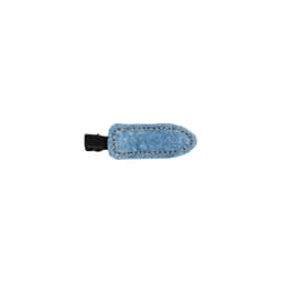 A denim hair clip in light blue with a black clasp, featuring contrasting stitching along the edges.