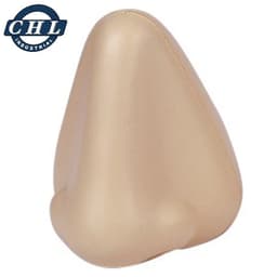 A beige nose-shaped stress reliever with a smooth surface, featuring a logo in the top corner.
