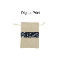 A beige drawstring bag featuring a navy floral patchwork band and a branded logo.