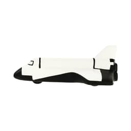 A shuttle-shaped stress reliever in white and black, designed for fun and relaxation. Features a logo.