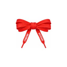 A red bow made from custom shoe laces, featuring tips with printed text.