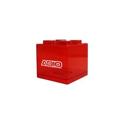 A red square block coin bank with a logo, featuring a distinct block shape.