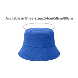 A blue reversible bucket hat with a textured finish and a round crown, featuring a logo.