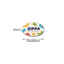 A round, 30mm epoxy sticker with a colourful design and a logo, featuring various shapes and a coffee shop name.