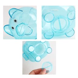 A light blue piggy coin bank with a transparent body, featuring removable coin slots and a cute face.
