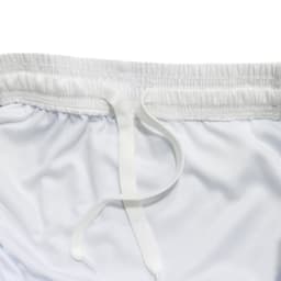 White polyester soccer shorts with a breathable lining and an elastic waistband featuring a drawstring.