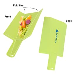 A green foldable chopping board with a handle, featuring a vibrant design on one side and a branding logo on the other.