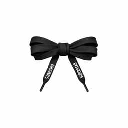 A set of black custom shoe laces tied in a bow, featuring branding on the lace ends.