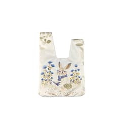 A short pile wrist bag featuring a rabbit in glasses, surrounded by blue flowers and greenery, with a subtle logo.