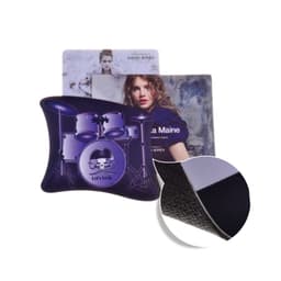 A purple mouse mat featuring a drum set design and textured underside, with additional promotional materials behind it.