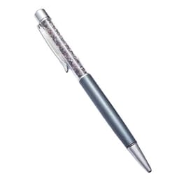 A black ink ballpoint pen with a silver and clear body featuring sparkling elements and a clip. It includes branding.