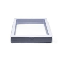A square 3D suspension package box in light grey with a push mechanism, featuring a smooth, textured surface.