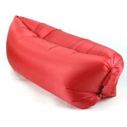 A red portable inflatable air lounger sofa with a smooth surface and a tapered design. Features a logo.
