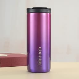 A drink bottle in a gradient finish of purple and pink with a black lid and a logo.