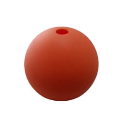 An orange silicone ice ball mold featuring a small hole at the top and a smooth, round design.