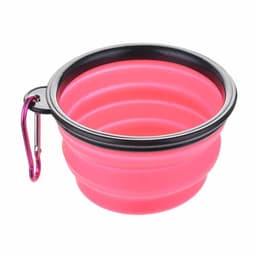 A pink collapsible pet bowl with a black rim and a carabiner clip attached.