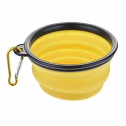 A yellow collapsible pet bowl with a black rim and a carabiner clip attached.